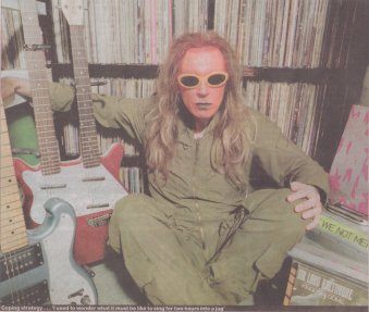 Julian and double necks pictured in the Guardian Review 19th Feb 2001 (Photograph by Pete Millson)